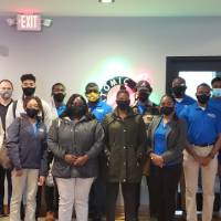 FVSU students and staff pose with Atomic Object employees